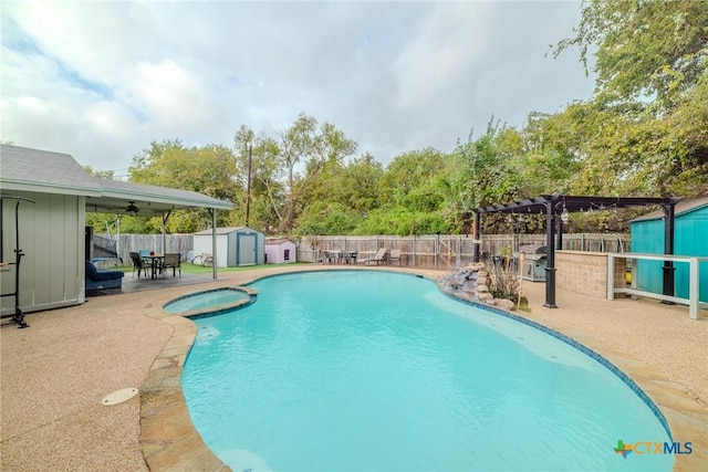 2703 Schulze Dr, Killeen, TX 76549 - view of pool featuring a shed, a fenced backyard, a patio, a pergola, and an outbuilding