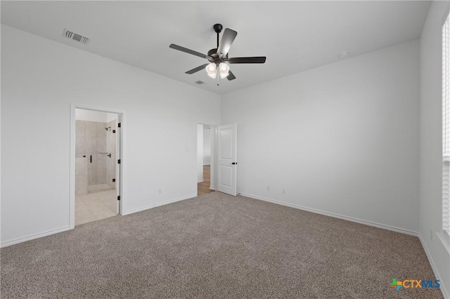 7915 Autumnwood Ln, Temple, TX 76502 - unfurnished bedroom featuring carpet flooring, baseboards, a ceiling fan, and connected bathroom