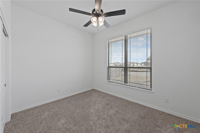 7915 Autumnwood Ln, Temple, TX 76502 - spare room featuring carpet, baseboards, and a ceiling fan