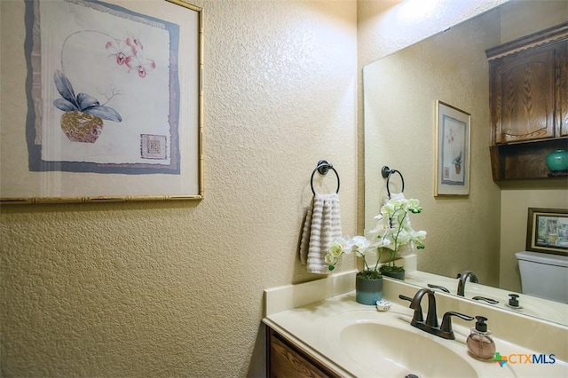 2601 Techny Dr, Harker Heights, TX 76548 - bathroom featuring vanity and a textured wall