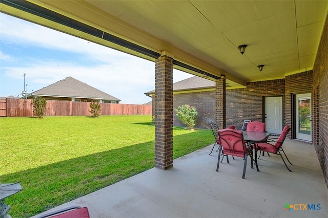 2601 Techny Dr, Harker Heights, TX 76548 - fenced backyard with a patio and outdoor dining space