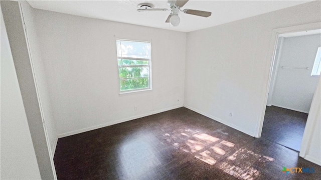 spare room with ceiling fan