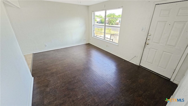 foyer featuring dark hardwood / wood-style floors