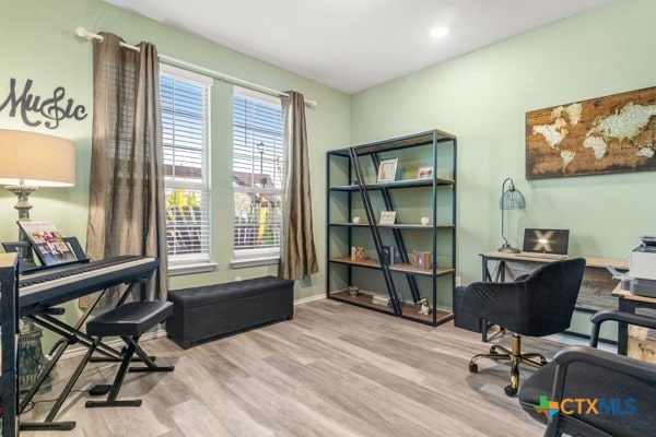 home office featuring light hardwood / wood-style flooring