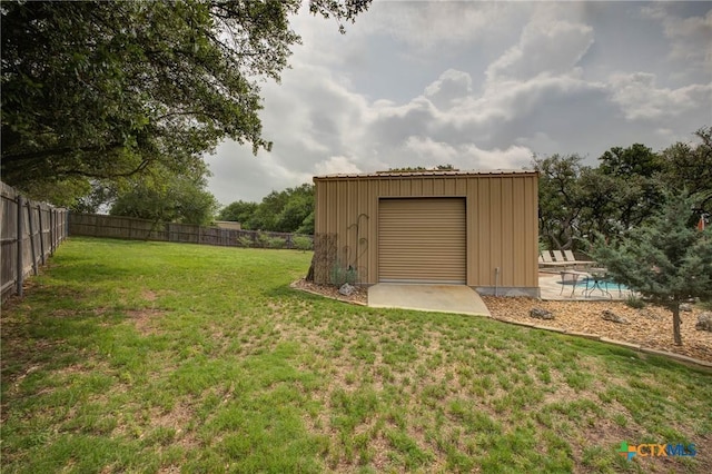 217 Foxwood, New Braunfels, TX 78132 - view of yard with an outdoor structure, a fenced backyard, and a fenced in pool