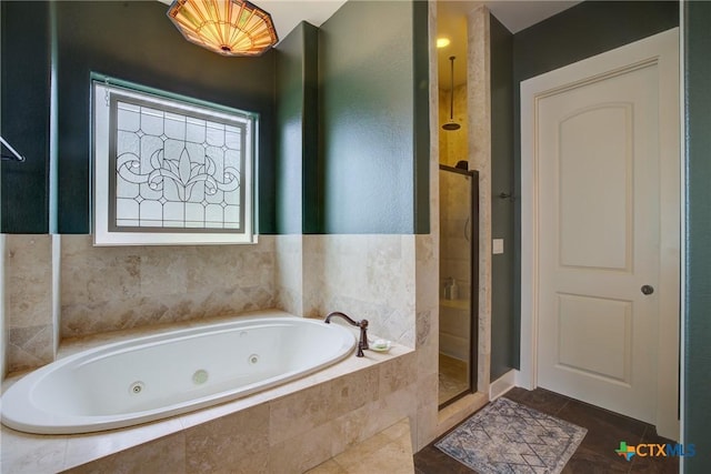 217 Foxwood, New Braunfels, TX 78132 - bathroom with a tub with jets, a shower stall, and tile patterned flooring