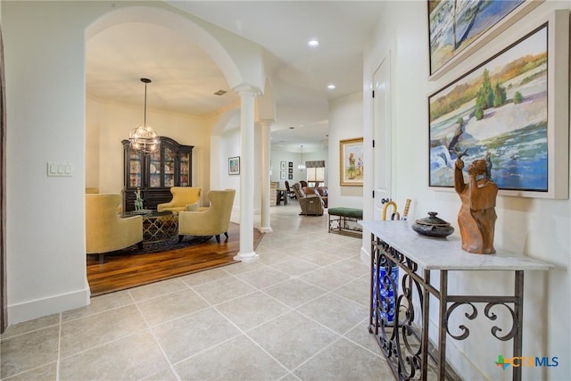 217 Foxwood, New Braunfels, TX 78132 - hallway with decorative columns, baseboards, recessed lighting, arched walkways, and light tile patterned floors
