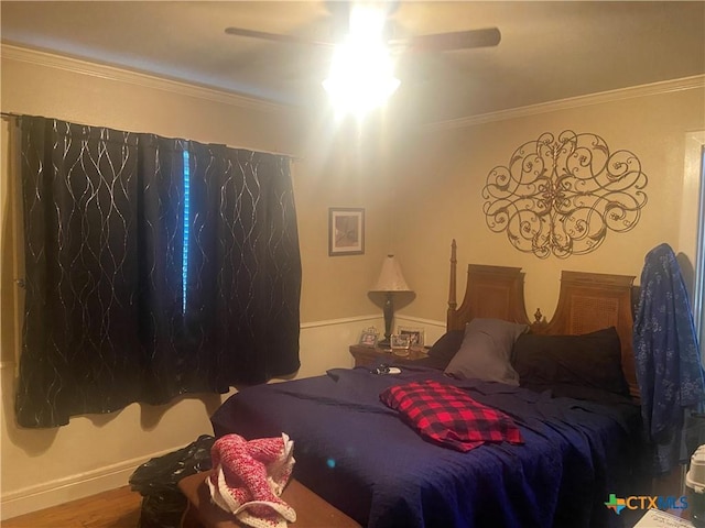 1002 Magnolia St, Belton, TX 76513 - bedroom featuring ornamental molding, wood finished floors, ceiling fan, and baseboards