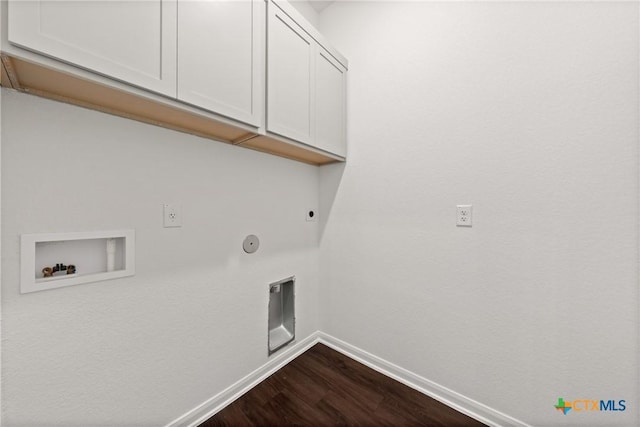 laundry area featuring gas dryer hookup, wood-type flooring, cabinets, hookup for a washing machine, and hookup for an electric dryer