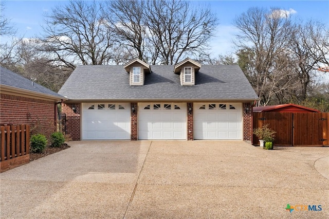 detached garage with fence