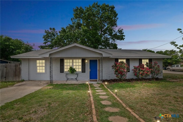 801 E Johnson St, Burnet, TX 78611 - ranch-style home with brick siding and a porch