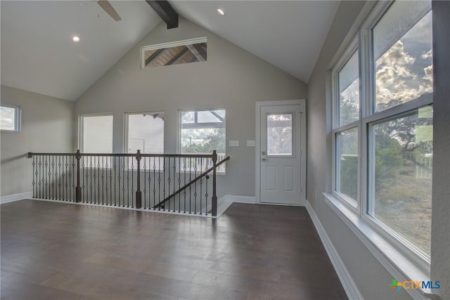 foyer entrance featuring beamed ceiling, ceiling fan, dark hardwood / wood-style flooring, and high vaulted ceiling