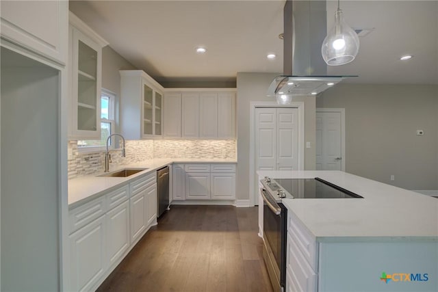 kitchen featuring white cabinetry, sink, stainless steel appliances, island exhaust hood, and pendant lighting