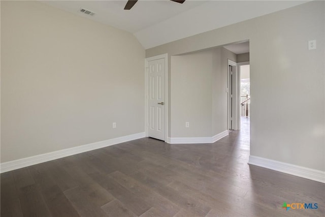 unfurnished room with dark hardwood / wood-style flooring, ceiling fan, and lofted ceiling