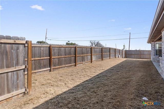 2446 Moreno Spur, Temple, TX 76501 - view of yard featuring a fenced backyard
