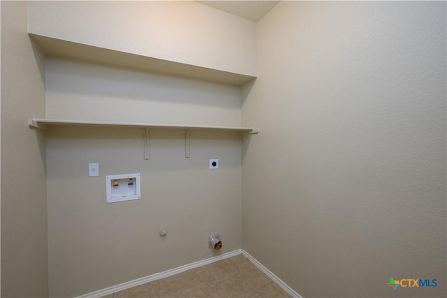 2109 Vernice Dr, Copperas Cove, TX 76522 - laundry room with baseboards, hookup for a washing machine, hookup for a gas dryer, laundry area, and electric dryer hookup