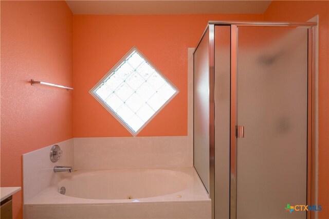 2109 Vernice Dr, Copperas Cove, TX 76522 - bathroom with a bath, vanity, and a stall shower