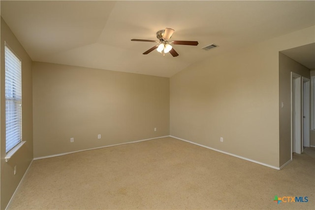 2109 Vernice Dr, Copperas Cove, TX 76522 - spare room featuring light colored carpet, visible vents, a ceiling fan, and vaulted ceiling