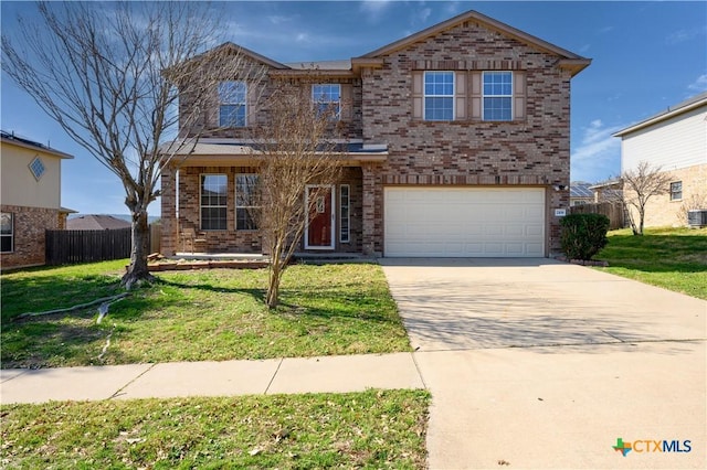 2109 Vernice Dr, Copperas Cove, TX 76522 - traditional-style home with a garage, fence, a front yard, brick siding, and driveway