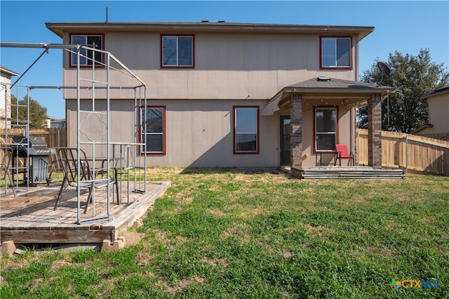 2109 Vernice Dr, Copperas Cove, TX 76522 - back of property featuring a yard, a wooden deck, and a fenced backyard