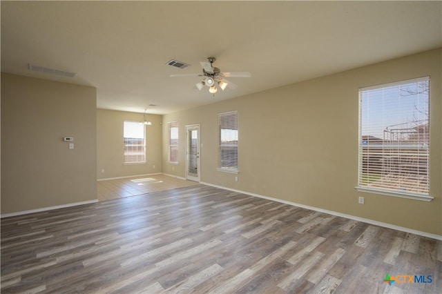 2109 Vernice Dr, Copperas Cove, TX 76522 - empty room featuring baseboards, a ceiling fan, visible vents, and wood finished floors