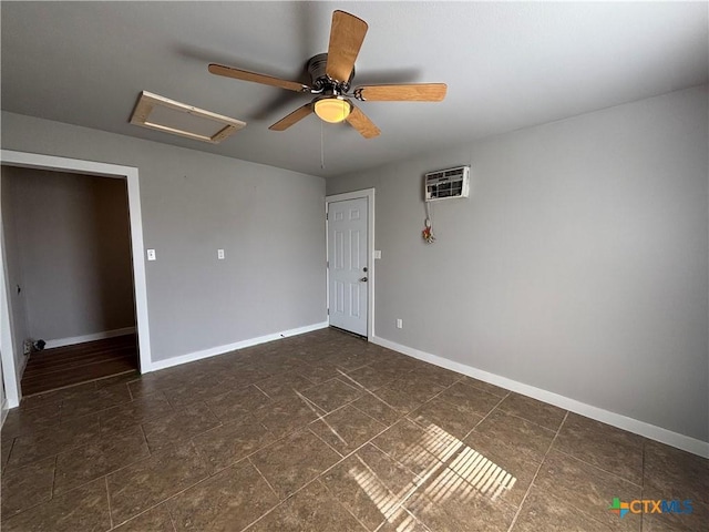 empty room featuring ceiling fan and an AC wall unit