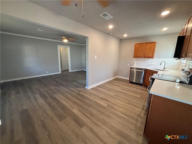 kitchen with wood-type flooring, sink, decorative backsplash, stainless steel dishwasher, and ceiling fan