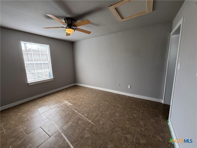 empty room featuring ceiling fan