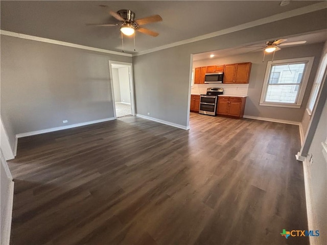 unfurnished living room with dark wood-type flooring, ceiling fan, and ornamental molding