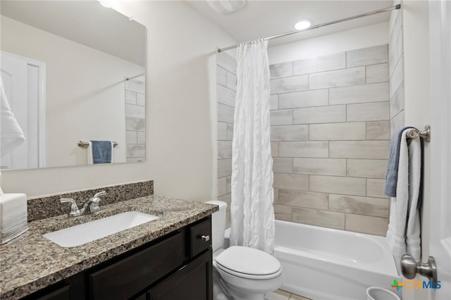 full bathroom featuring vanity, shower / bath combo, and toilet