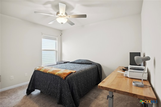 bedroom featuring ceiling fan and carpet