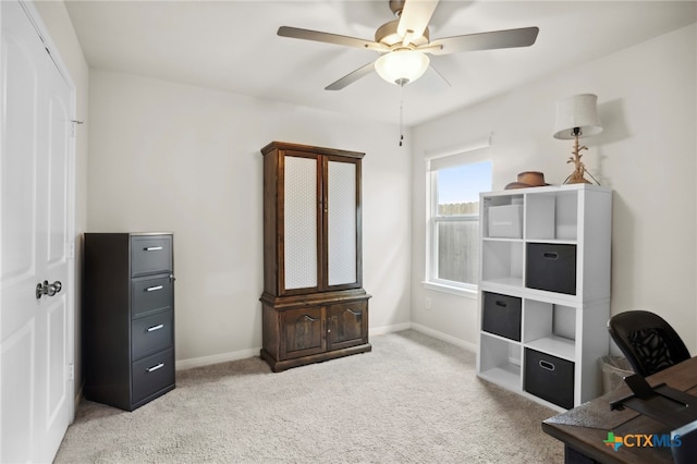 office featuring carpet flooring and ceiling fan