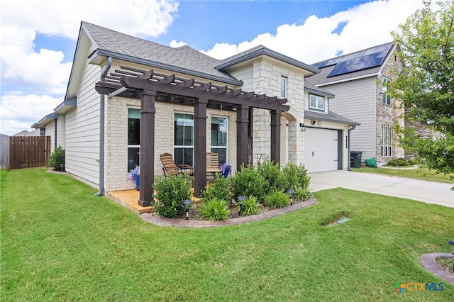 view of front facade with a garage and a front lawn