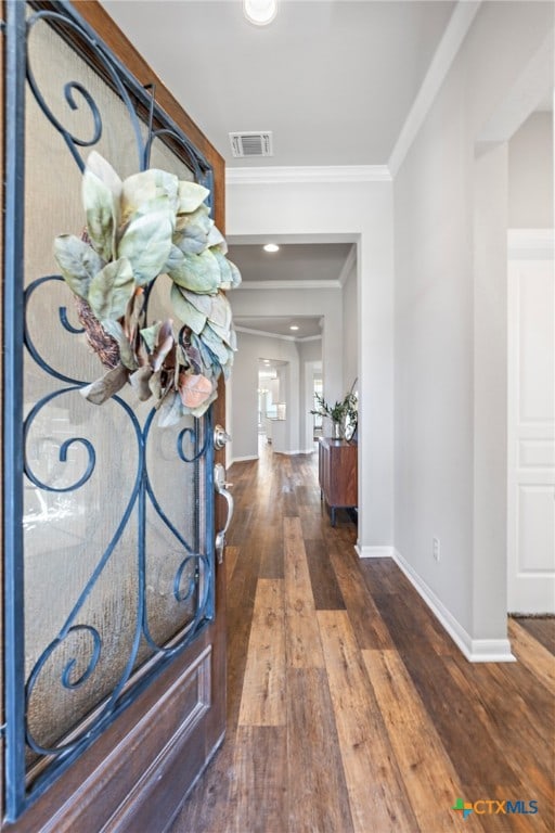 hallway with crown molding and dark wood-type flooring