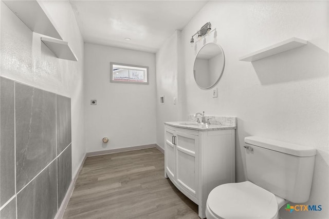 1814 S 5th St, Temple, TX 76504 - bathroom featuring vanity and wood finished floors