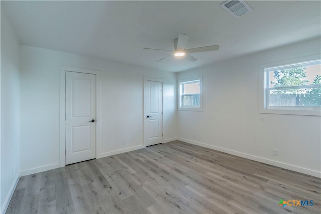 4013 Valley View Dr, Temple, TX 76502 - unfurnished bedroom featuring light wood-type flooring, baseboards, and a ceiling fan