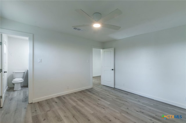 4013 Valley View Dr, Temple, TX 76502 - unfurnished bedroom featuring light wood-type flooring, baseboards, and ensuite bath