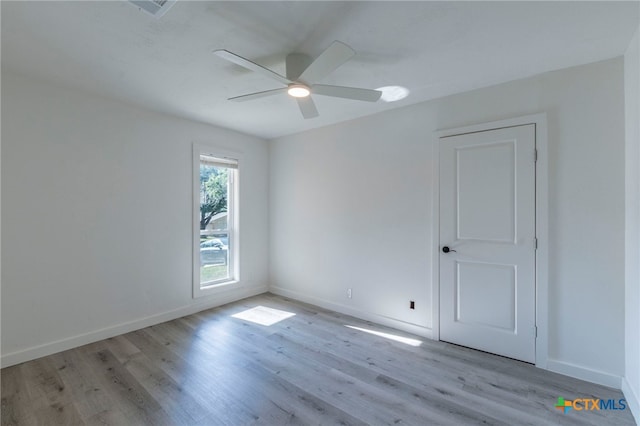 4013 Valley View Dr, Temple, TX 76502 - spare room with a ceiling fan, wood finished floors, and baseboards