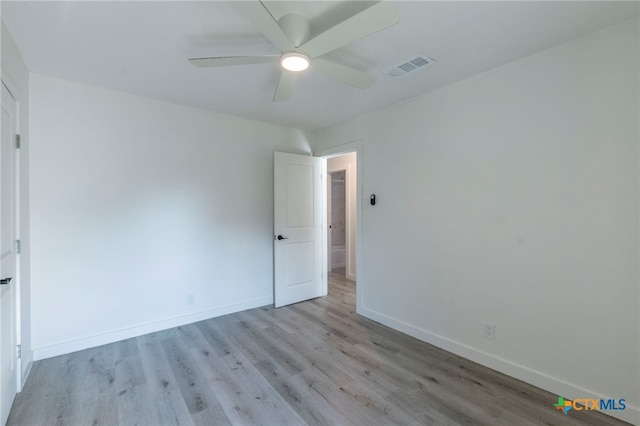 4013 Valley View Dr, Temple, TX 76502 - unfurnished bedroom featuring light wood-type flooring, baseboards, and a ceiling fan