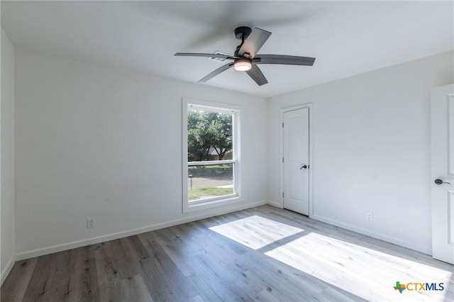 4013 Valley View Dr, Temple, TX 76502 - unfurnished bedroom featuring light wood finished floors, baseboards, and a ceiling fan