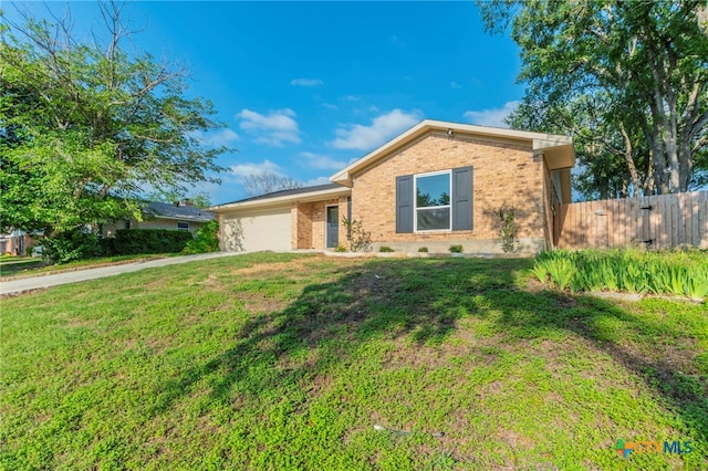 4013 Valley View Dr, Temple, TX 76502 - single story home featuring brick siding, an attached garage, and driveway