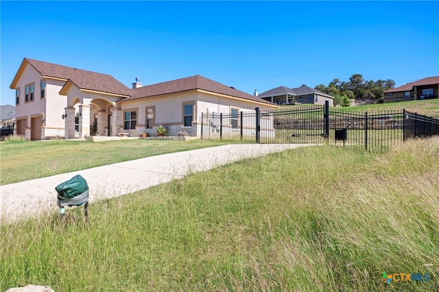 view of front of property with a front yard