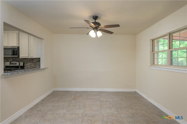 409 W Mary Jane Dr, Killeen, TX 76541 - unfurnished dining area with ceiling fan and light tile patterned flooring