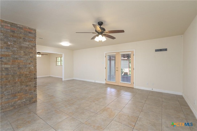 409 W Mary Jane Dr, Killeen, TX 76541 - empty room with light tile patterned floors, a ceiling fan, plenty of natural light, and french doors