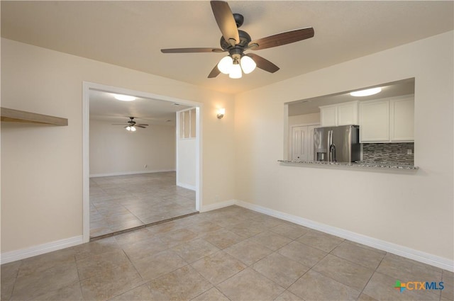409 W Mary Jane Dr, Killeen, TX 76541 - unfurnished room with a ceiling fan and light tile patterned floors