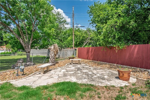 409 W Mary Jane Dr, Killeen, TX 76541 - fenced backyard featuring a patio