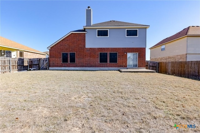 back of property featuring a patio