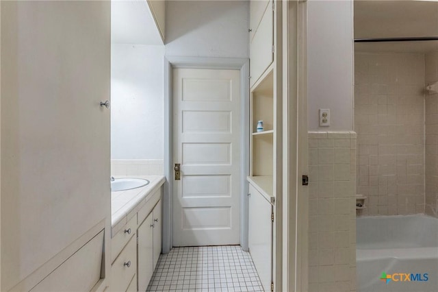 bathroom featuring vanity and tile patterned flooring