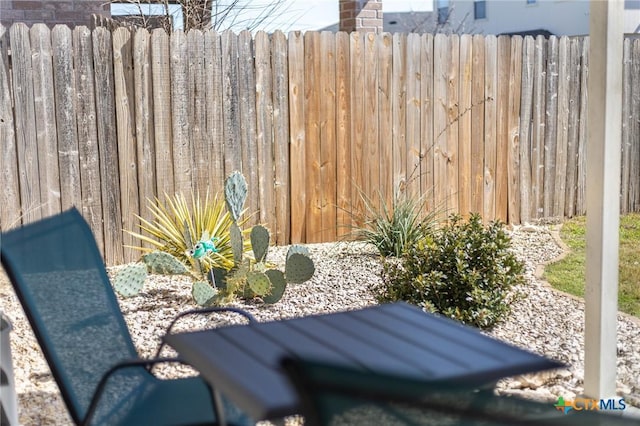 view of patio with fence