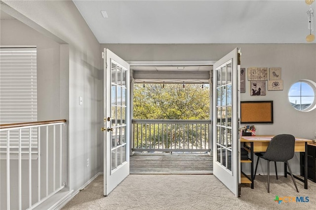 doorway with carpet and french doors